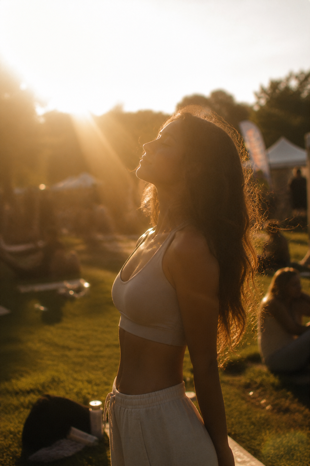 Portrait of a freckled woman with closed eyes in sunlight
